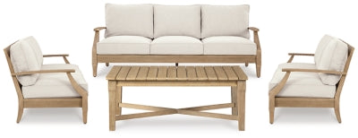 Outdoor table set by Ashley Furniture featuring a wooden table and matching chairs from the Carter Hall collection.