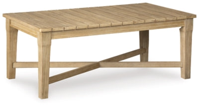 Ashley Furniture Carter Hall outdoor table set with a round table and four matching chairs, featuring a sturdy metal frame and wooden accents.