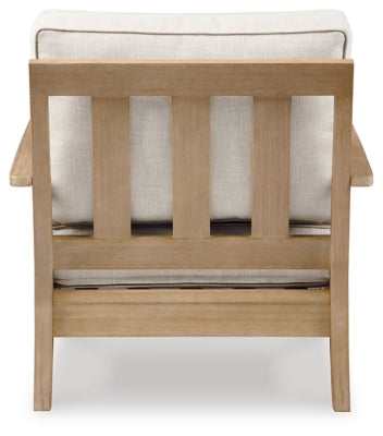 Ashley Furniture Carter Hall outdoor table set with a table and chairs, ideal for patio or garden outdoor dining.