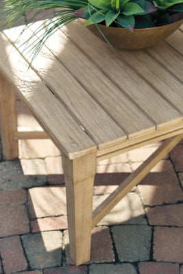 Ashley Furniture Carter Hall outdoor table set with four chairs, featuring a metal table and woven chairs for outdoor dining.