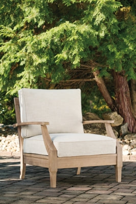 Ashley Furniture Carter Hall outdoor table set with a rectangular table and matching chairs, ideal for patio dining and outdoor gatherings.