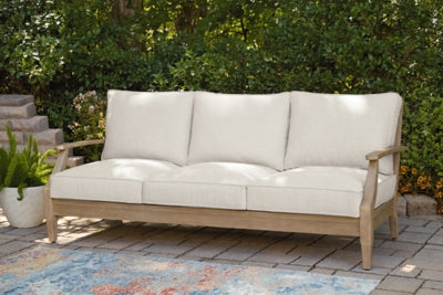 Ashley Furniture Carter Hall outdoor table set with a rectangular table and matching chairs, perfect for patio dining.