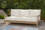 Ashley Furniture Carter Hall outdoor table set with a rectangular table and matching chairs, perfect for patio dining.