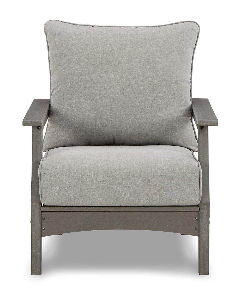 Ashley Furniture Visola outdoor sofa and loveseat set with matching outdoor table, featuring weather-resistant cushions and stylish design.