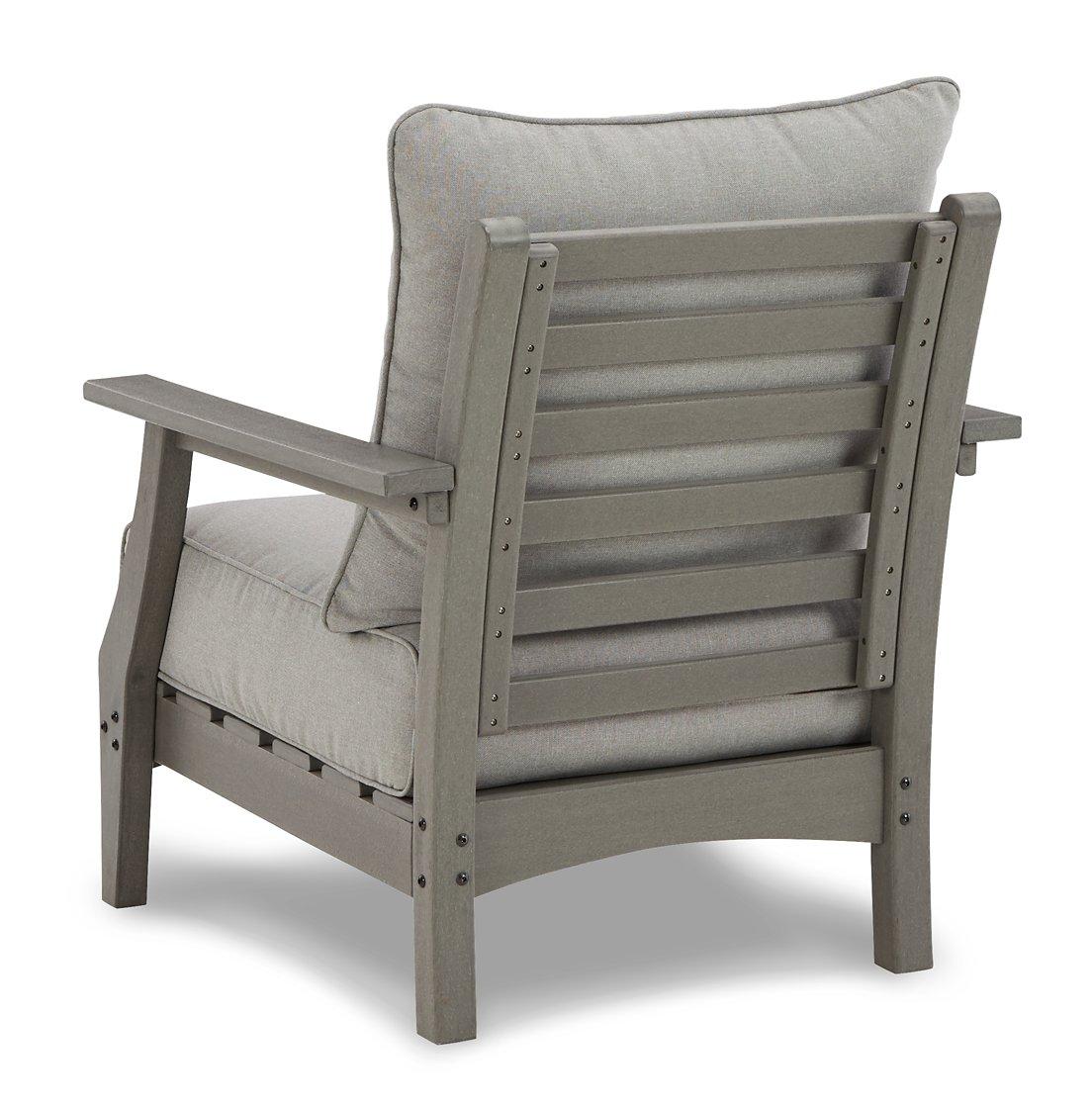 Ashley Furniture Visola outdoor sofa and loveseat set with a matching outdoor table, featuring comfortable cushions and stylish design.