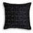 Set of four Ashley Furniture Kydner decorative pillows with patterned fabric and plush texture, arranged on a neutral-colored sofa.