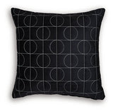 Set of four Ashley Furniture Kydner decorative pillows with patterned fabric and plush texture, arranged on a neutral-colored sofa.
