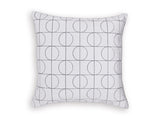 Set of four Ashley Furniture Kydner pillows with plush fabric and decorative patterns, perfect for bedroom or living room decor.