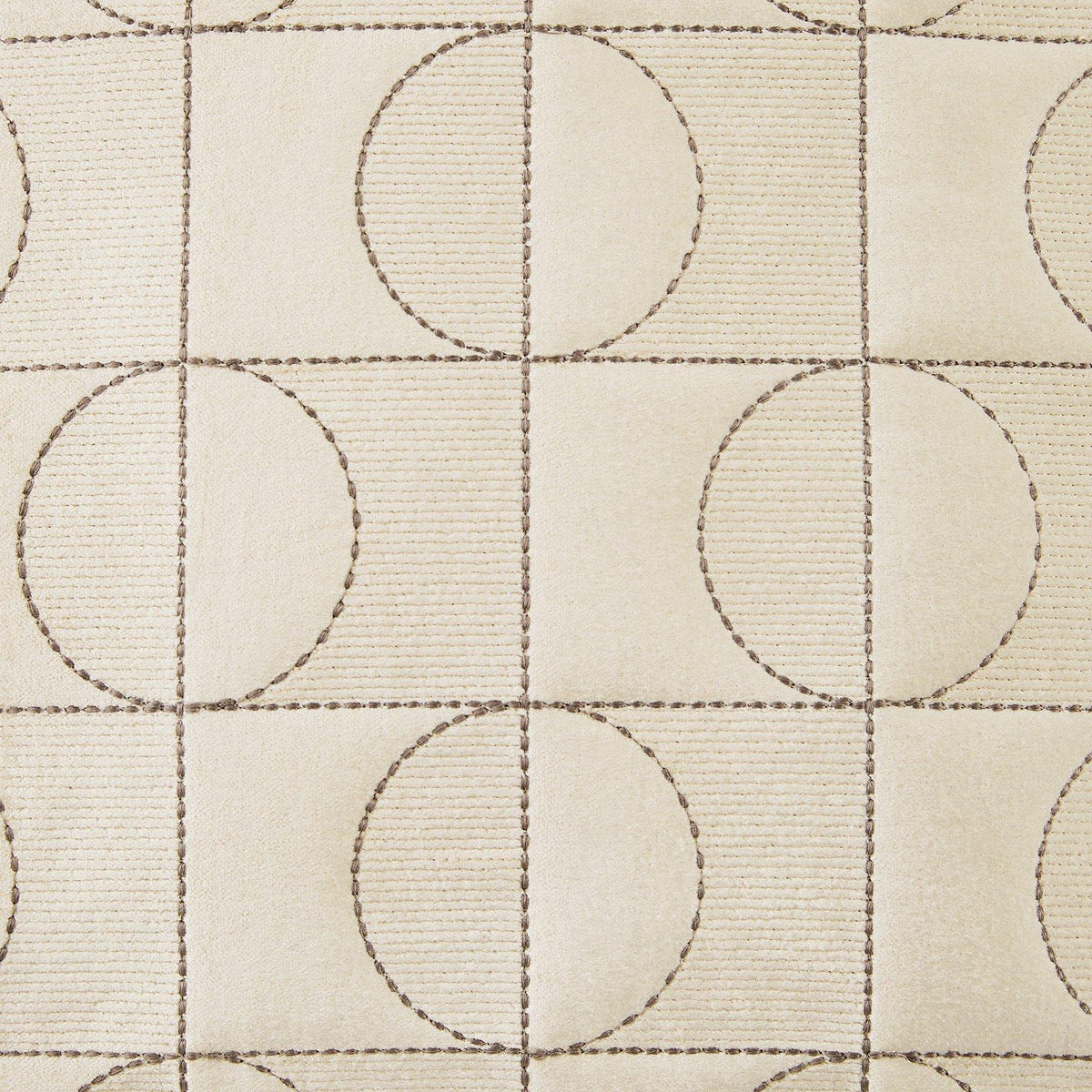 Set of four Ashley Furniture Kydner pillows with soft fabric and decorative patterns, perfect for enhancing living room decor.