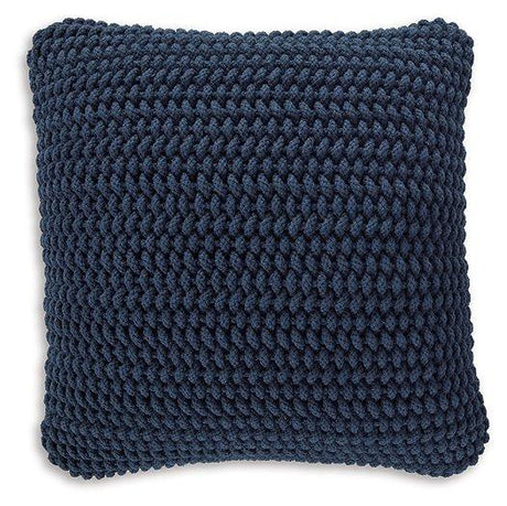 Set of four Ashley Furniture Renemore pillows with soft fabric covers and decorative stitching, ideal for sofa or bed decor.
