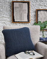 Set of four Ashley Furniture Renemore pillows with soft fabric covers, ideal for bedroom or living room decor.
