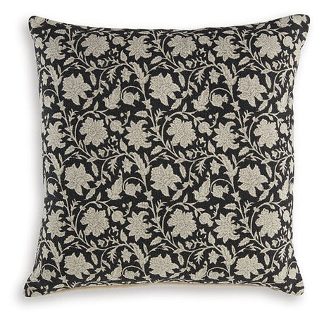 Set of four Ashley Furniture Alanderson pillows with patterned fabric and plush filling, arranged on a modern sofa.