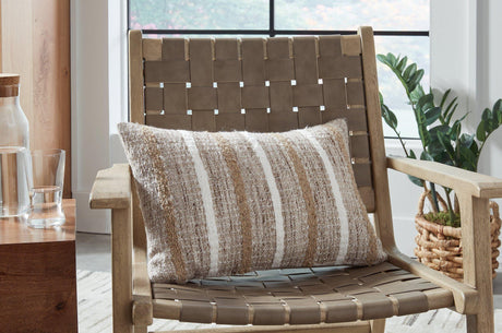 Set of four Ashley Furniture Benish pillows with soft fabric and decorative patterns, perfect for sofa or bed decor.