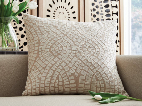 Set of four Ashley Furniture Cortlen pillows with stylish fabric covers, perfect for adding comfort and decor to living spaces.