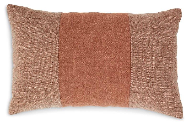 Ashley Furniture Dovinton Pillow featuring plush fabric and decorative design, perfect for adding comfort and style to a living space.