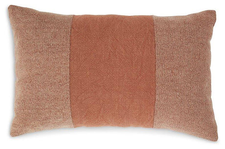 Ashley Furniture Dovinton Pillow featuring plush fabric and decorative design, perfect for adding comfort and style to a living space.