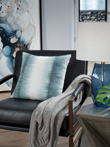 Set of four Ashley Furniture Elonwich pillows featuring soft fabric, decorative stitching, and modern design perfect for home decor.