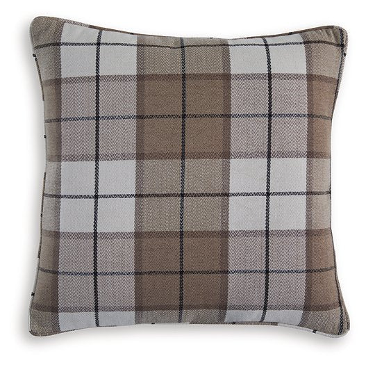 Set of four Godricton pillows by Ashley Furniture featuring soft fabric and decorative patterns for stylish home decor.