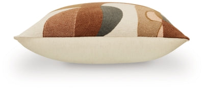 Set of four Ashley Furniture Hallam pillows with decorative fabric and plush filling, arranged on a neutral-colored sofa.