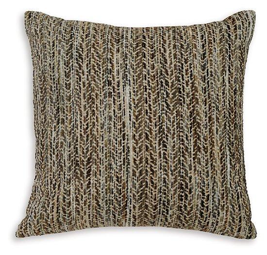 Set of four Ashley Furniture Jayner pillows with soft fabric covers, displayed in a cozy living room setting.