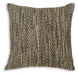 Set of four Ashley Furniture Jayner pillows with soft fabric covers, displayed in a cozy living room setting.