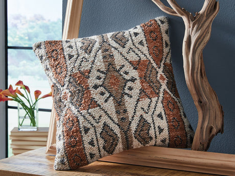 Set of four Ashley Furniture Kierenworth pillows featuring soft fabric and decorative patterns for cozy bedroom decor.