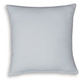 Set of four Ashley Furniture Paulmour pillows with decorative patterns and plush fabric, perfect for enhancing sofa or bed decor.