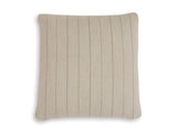 Set of four Ashley Furniture Valwick pillows with soft fabric covers, arranged on a cozy sofa for stylish comfort.