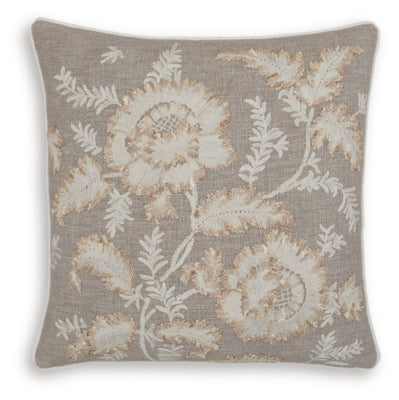 Set of four Ashley Furniture Viveka pillows with decorative patterns and neutral tones, suitable for sofa or bed decor.