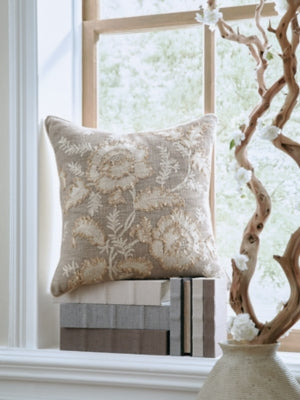 Set of four Ashley Furniture Viveka pillows featuring soft fabric covers and decorative patterns for stylish home decor.