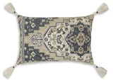 Set of four Ashley Furniture Winbury pillows with decorative fabric and plush filling, ideal for sofa or bed decor.
