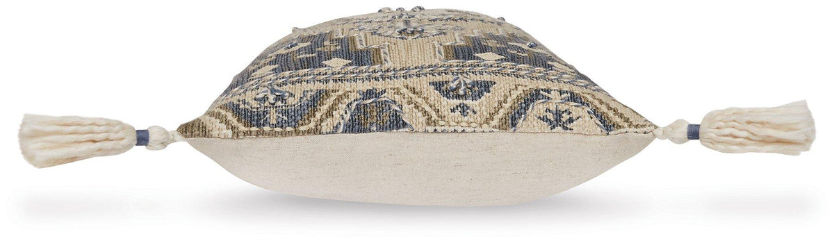 Set of four Ashley Furniture Winbury pillows with neutral fabric and decorative throw pillow design, perfect for bedroom or sofa decor.