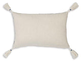 Set of four Ashley Furniture Winbury pillows featuring soft, neutral fabric and decorative accents for cozy bedroom decor.