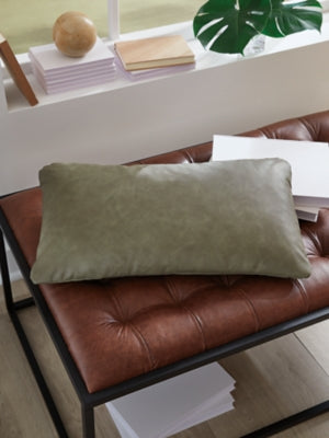 Set of four Ashley Furniture Danvale pillows with soft fabric covers and decorative patterns, perfect for bedroom or living room decor.