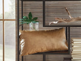 Set of four Ashley Furniture Danvale pillows with soft fabric covers, arranged neatly on a neutral-colored sofa.