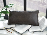 Set of four Ashley Furniture Danvale pillows with soft fabric covers, arranged on a neutral-colored sofa.