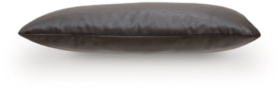 Set of four Ashley Furniture Danvale pillows with decorative patterns, shown in a cozy living room setting.