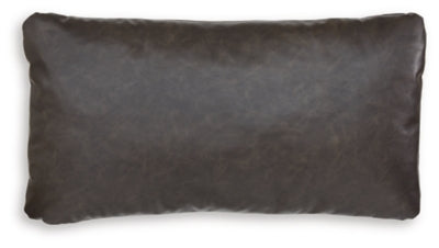 Set of four Ashley Furniture Danvale pillows with soft fabric covers, arranged in a cozy living room setting.