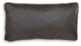 Set of four Ashley Furniture Danvale pillows with soft fabric covers, arranged in a cozy living room setting.