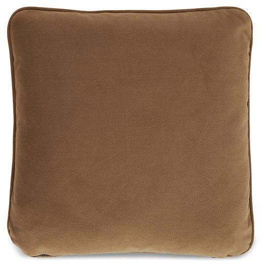 Ashley Furniture Caygan pillow featuring soft fabric with textured pattern, displayed on a modern sofa for cozy home decor.