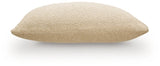 Set of four Ashley Furniture Macsen pillows with decorative covers, featuring textured fabric and neutral tones, arranged on a sofa.