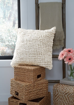 Ashley Furniture Aavie Pillow with soft fabric and plush filling, perfect for comfortable lounging or decorative use.