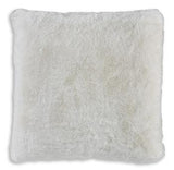 Set of four Ashley Furniture Gariland pillows with textured fabric and decorative patterns arranged on a sofa.