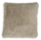 Set of four Ashley Furniture Gariland pillows featuring neutral fabric with textured patterns, perfect for sofa or bed decor