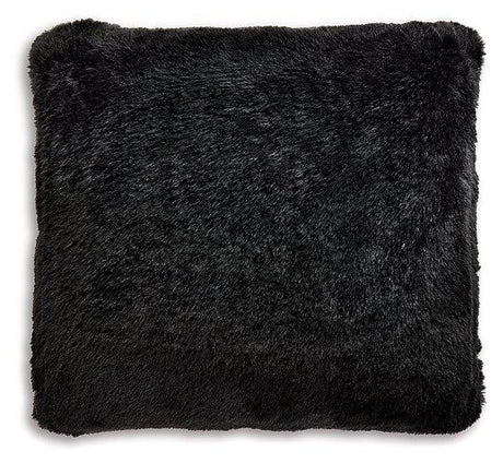 Set of four Ashley Furniture Gariland pillows featuring soft fabric, decorative patterns, and plush filling for comfortable home decor.