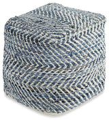Chevron pouf by Ashley Furniture with colorful fabric and tufted design, perfect for living room or bedroom decor.