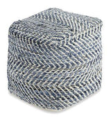 Chevron pouf by Ashley Furniture with a stylish fabric cover, perfect as a versatile accent piece for living rooms.