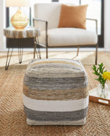 Ashley Furniture Josalind pouf, soft fabric with tufted design, versatile accent piece for living room or bedroom decor.