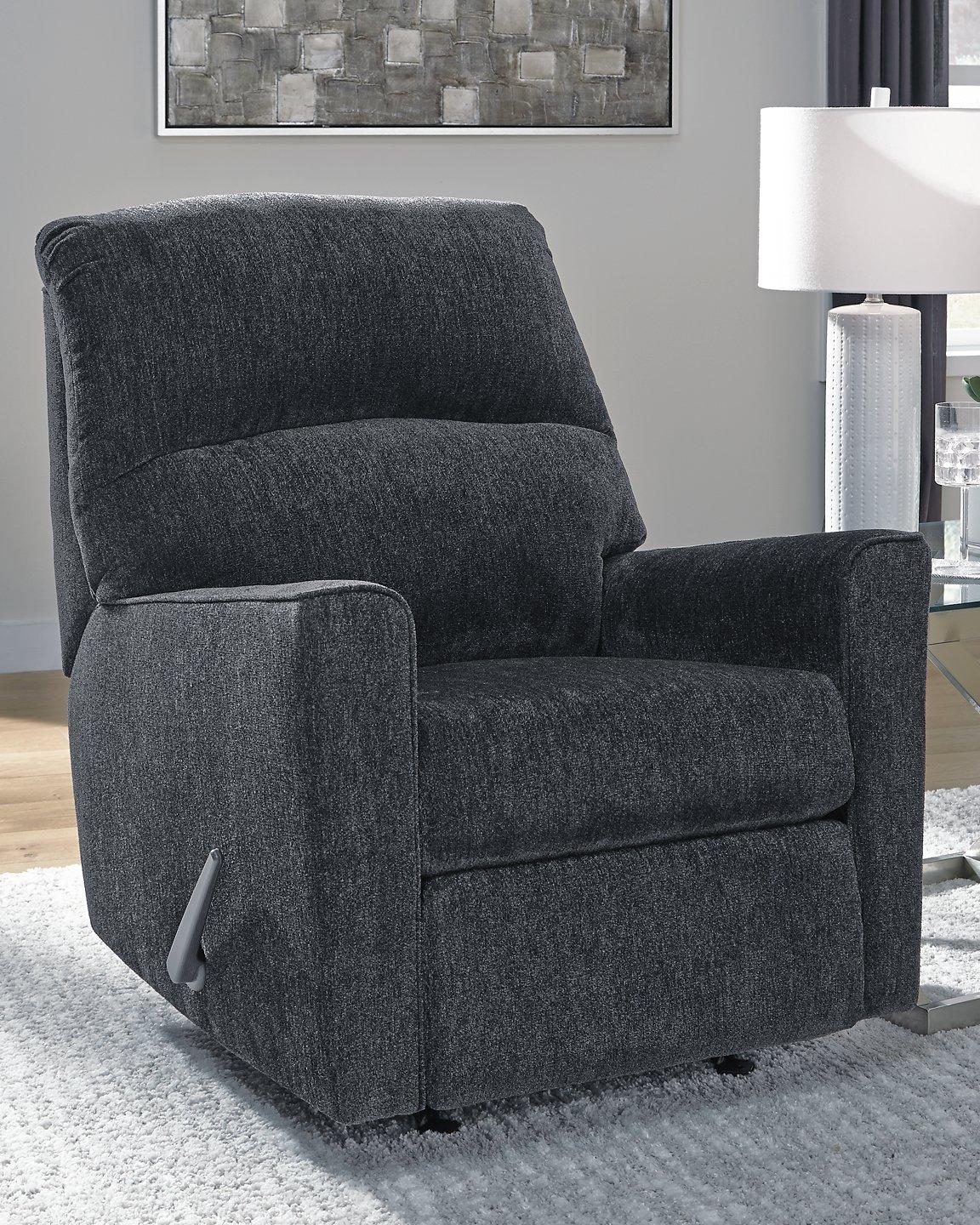 Comfortable Ashley Furniture Altari recliner with plush upholstery and padded armrests, perfect for relaxing in any living room.