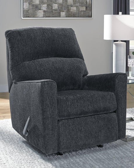 Comfortable Ashley Furniture Altari recliner with plush upholstery and padded armrests, perfect for relaxing in any living room.